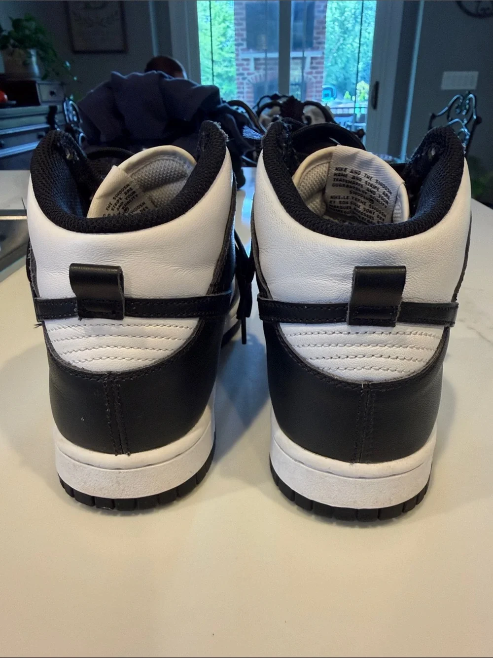 Nike Black and White Mid-Top Sneakers